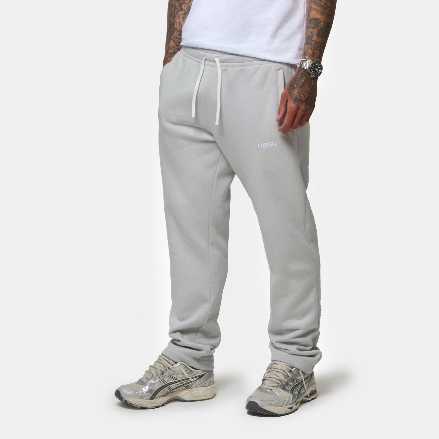 Model not showing face and close up on the ice grey jogger, front view